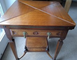 Edwardian Oak Envelope Top Card Table With Lower Galleried Tier And Green Base. SOLD.